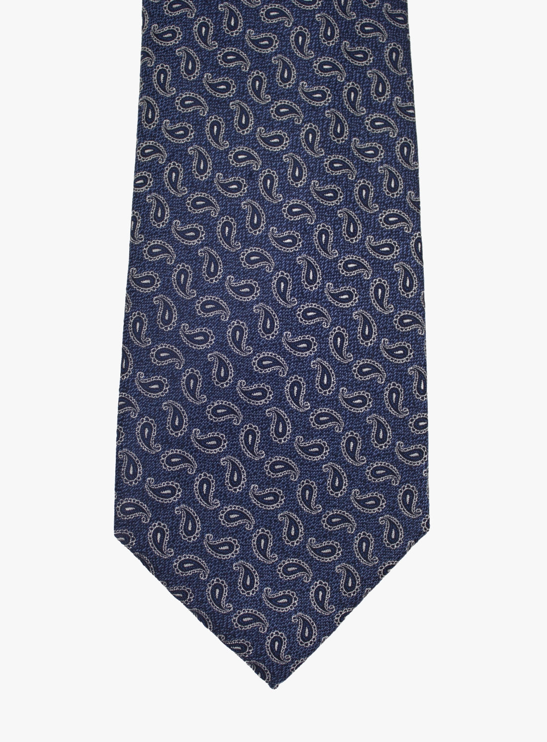 Navy blue tie with paisley pattern on a white background