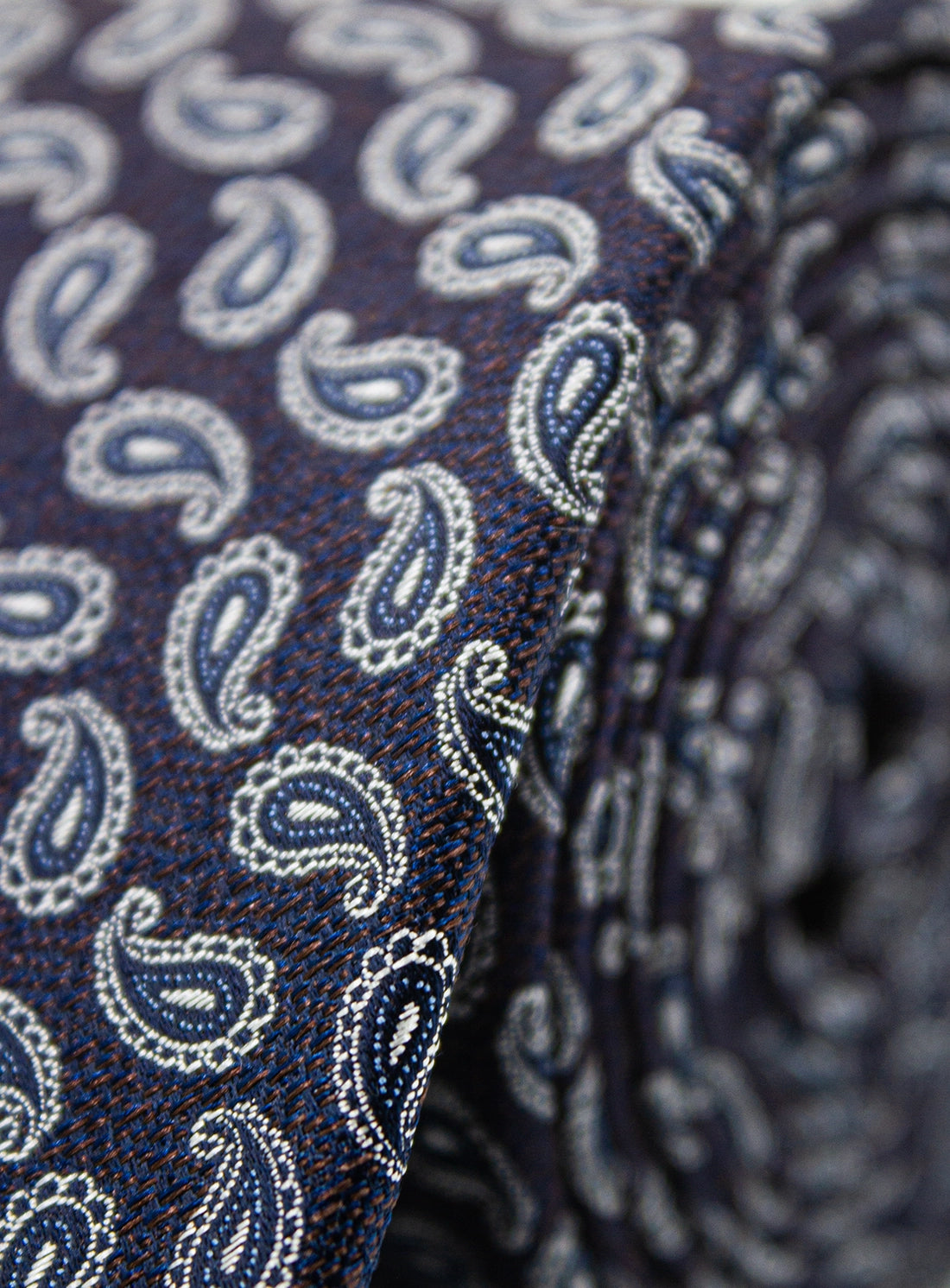 Close-up of a blue and white paisley patterned fabric